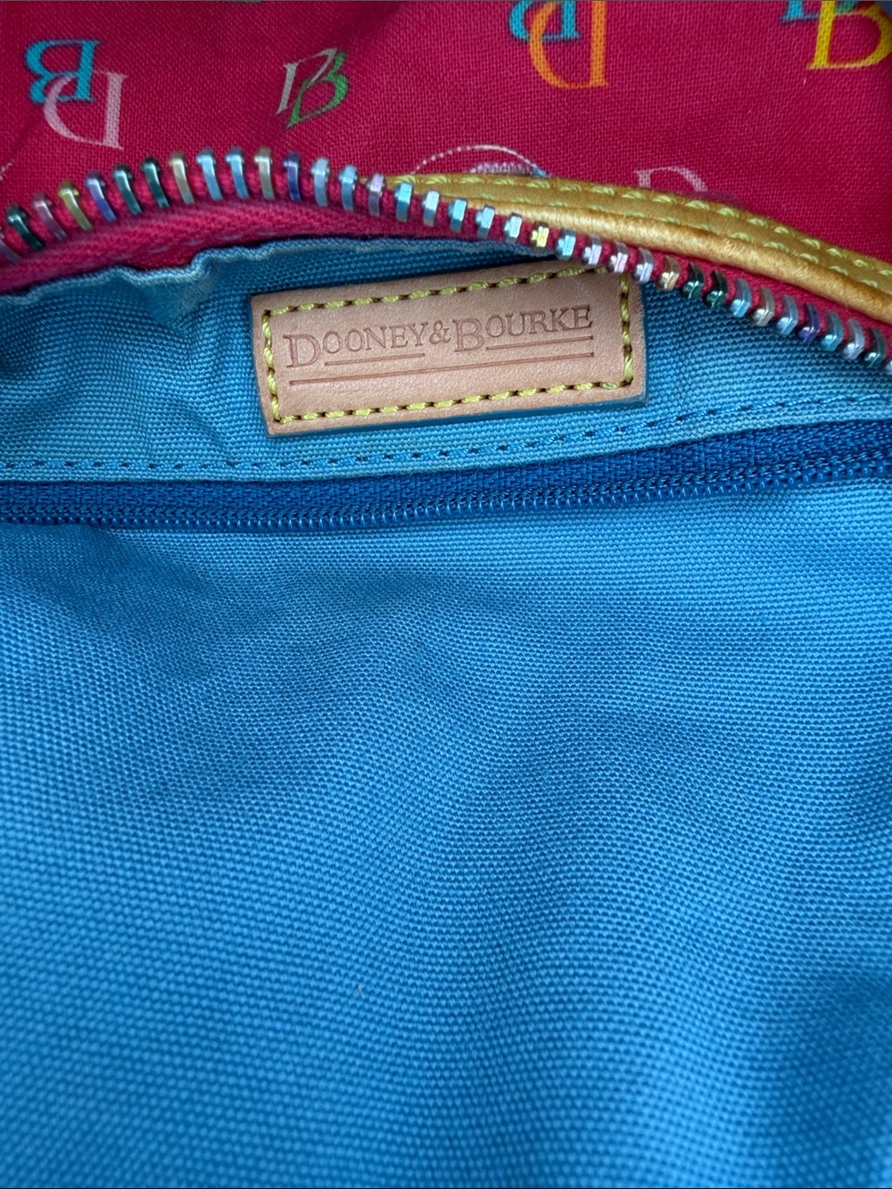Dooney &Bourke monogrammed canvas w/leather trim and  handle barrel bag - Picture 9 of 11